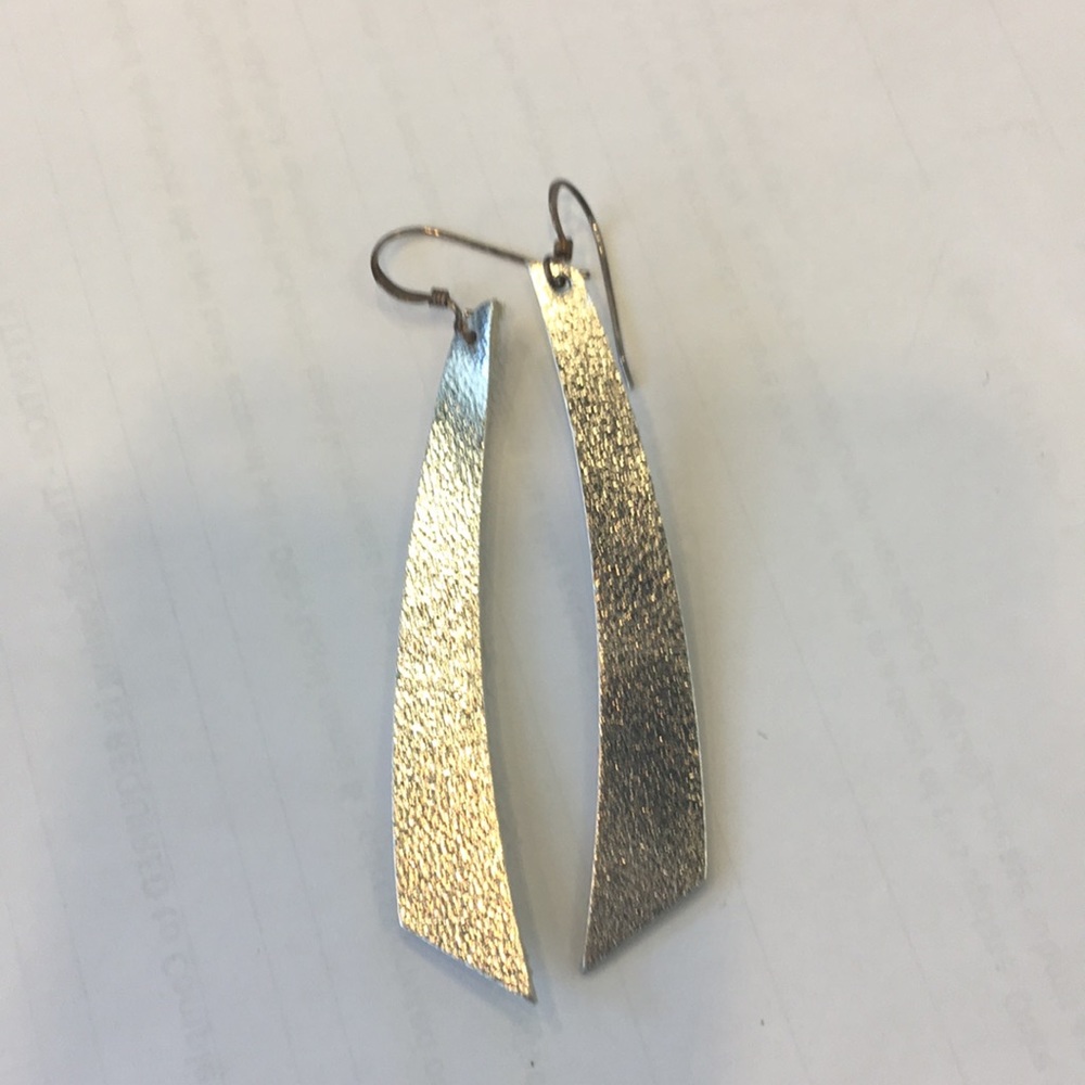 Nickel and suede stick earrings